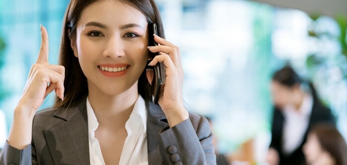 woman-phone-finger-pointing-up