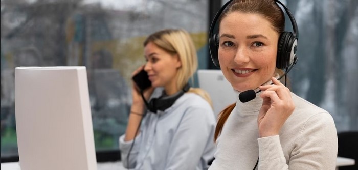 Woman working with headphone.